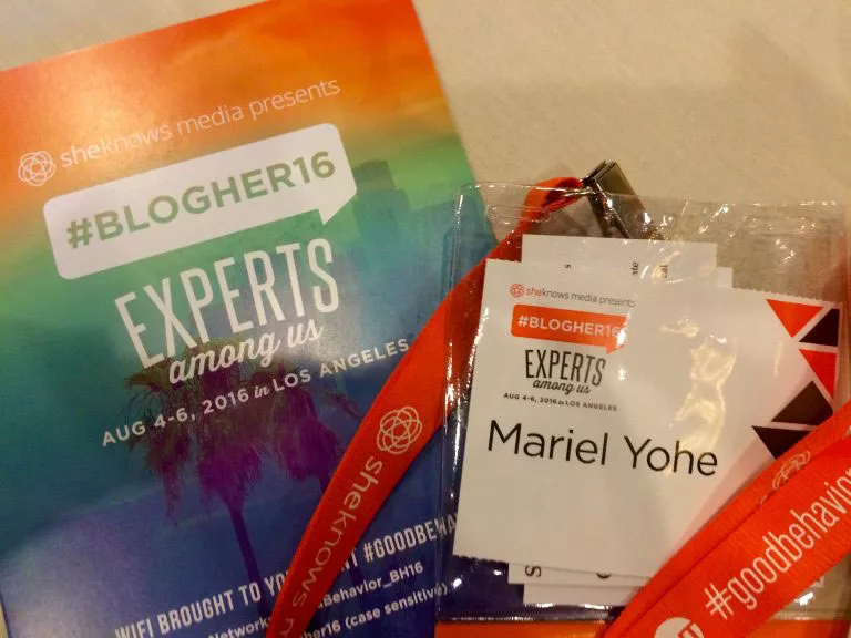 BlogHer16 conference brochure and name badge with lanyard.