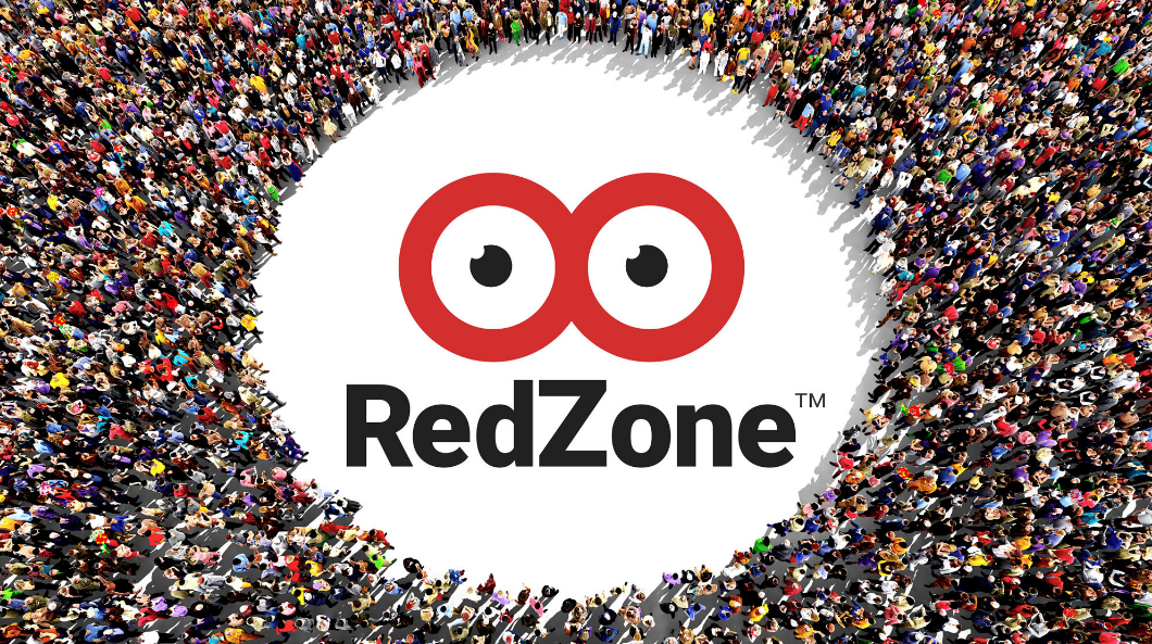 Large crowd with RedZone logo and eye-catching mascot centerpiece