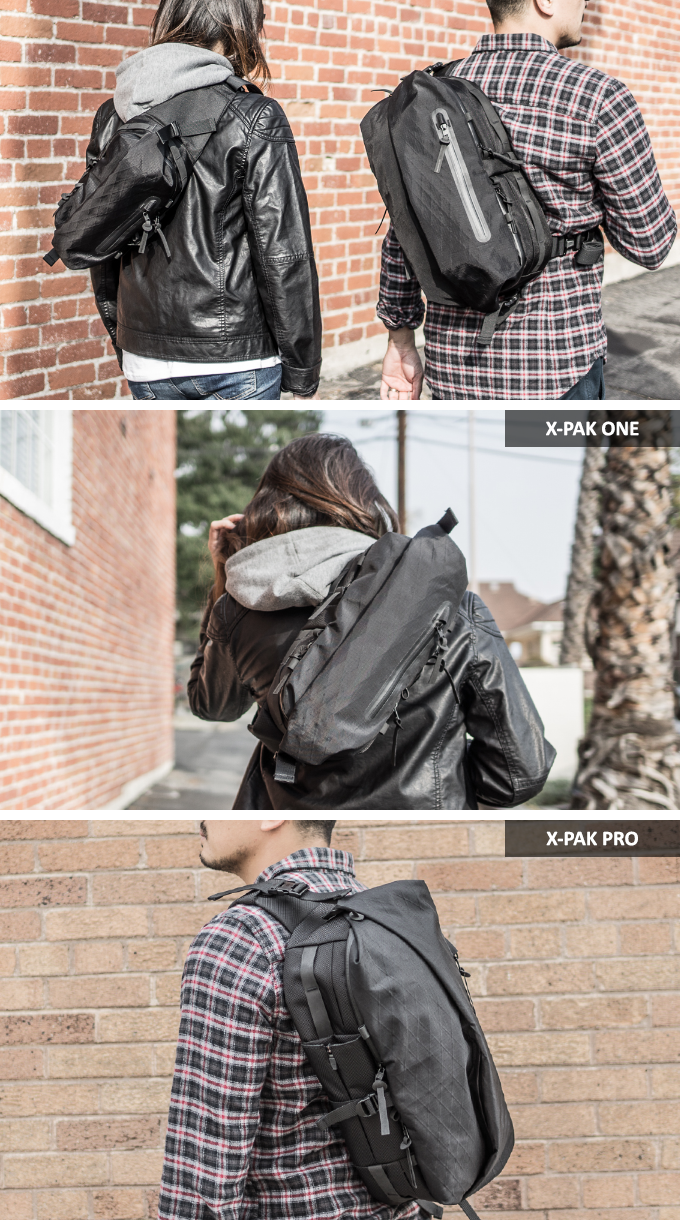 People modeling urban backpacks X-PAK ONE and X-PAK PRO against brick walls