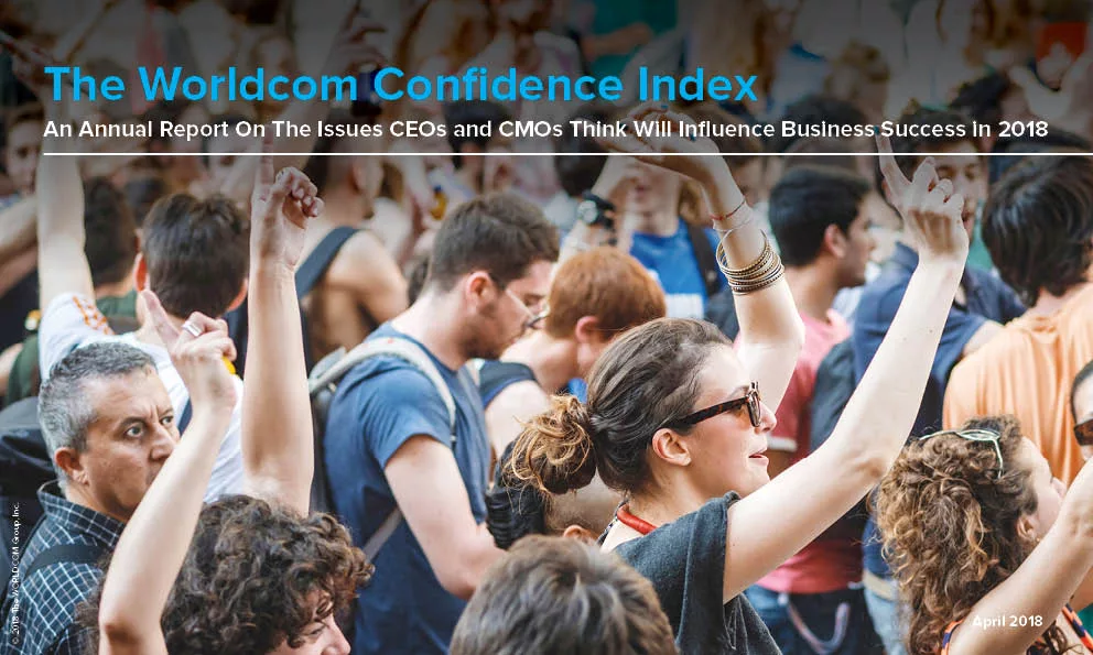 Crowd raising hands at Worldcom Confidence Index report presentation.