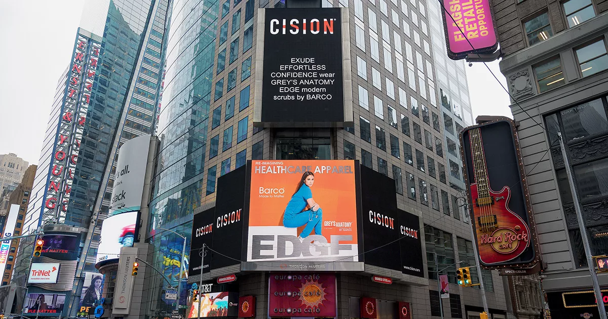 Times Square billboards with ads for modern healthcare apparel and retail opportunities