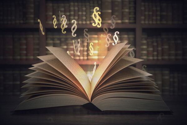 Open book with glowing musical notes on library background