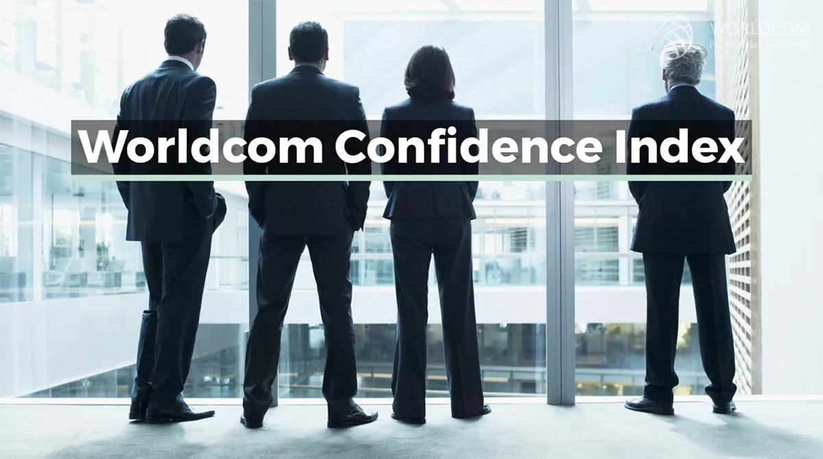 Four professionals looking out a window with Worldcom Confidence Index text.