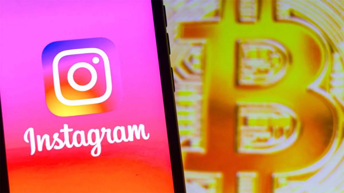 Instagram logo on screen next to blurred Bitcoin symbol.