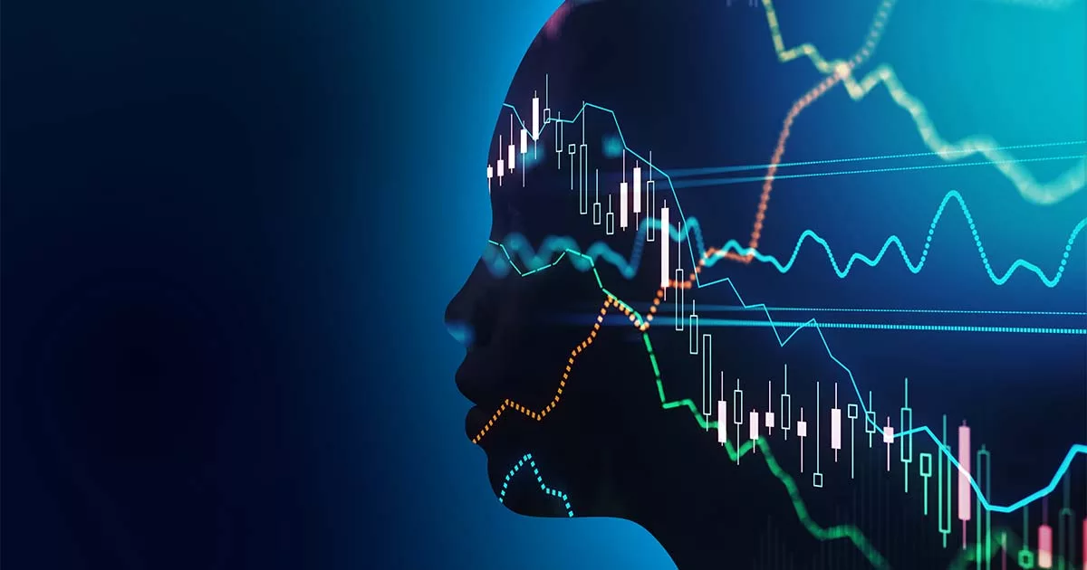 Silhouette of human head with overlay of financial charts on dark blue background