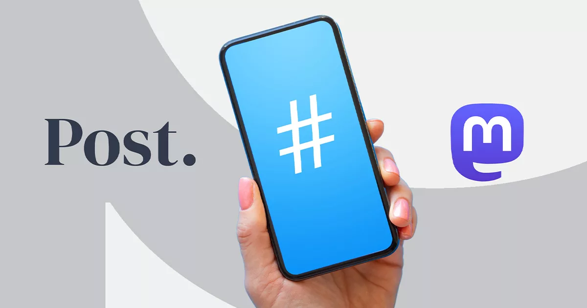 Hand holding smartphone with hashtag symbol on screen