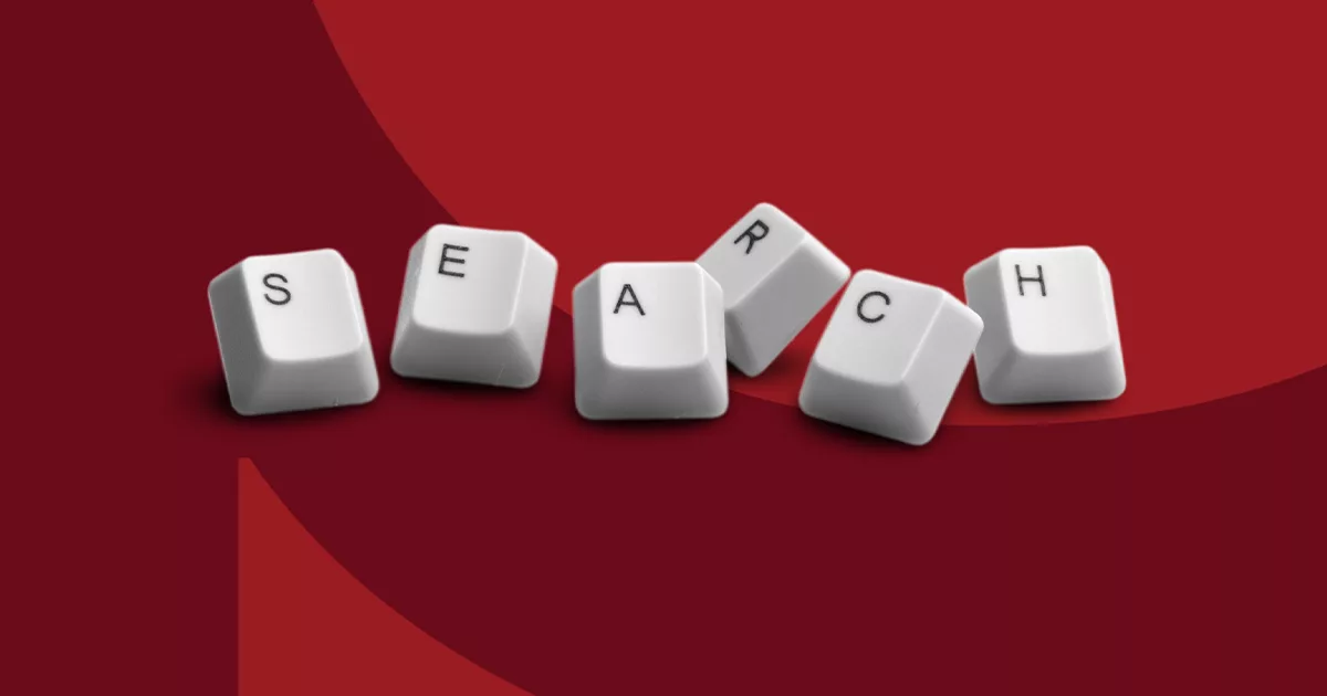 Keyboard keys spelling SEARCH on a red background for SEO concept