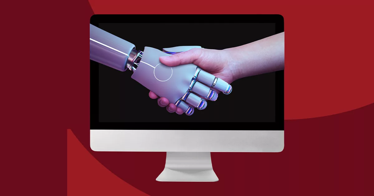 Robot and human hand shaking through a computer screen on a red background