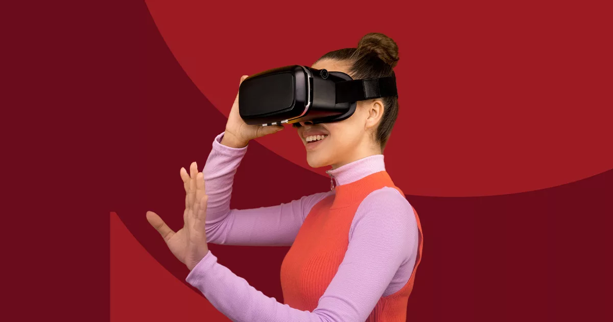 Woman experiencing virtual reality with VR headset against a red background.