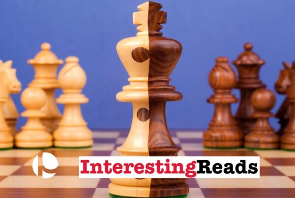 Chess pieces merging together against a dark blue background