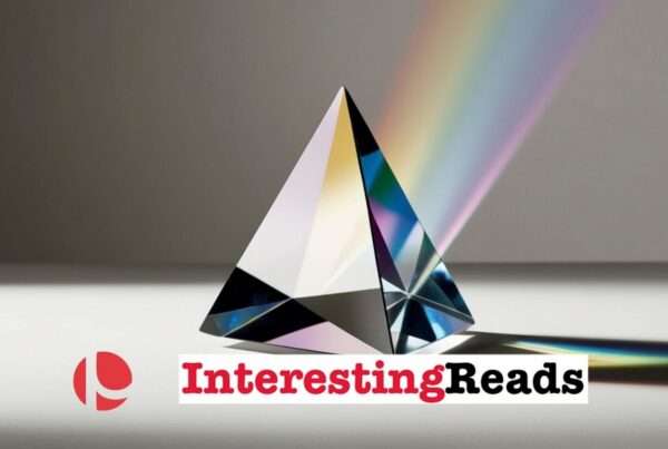 A triangular prism reflecting light against a gray background.