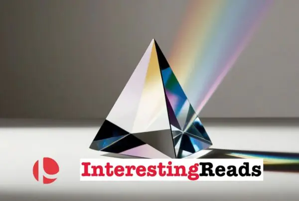 A triangular prism reflecting light against a gray background.